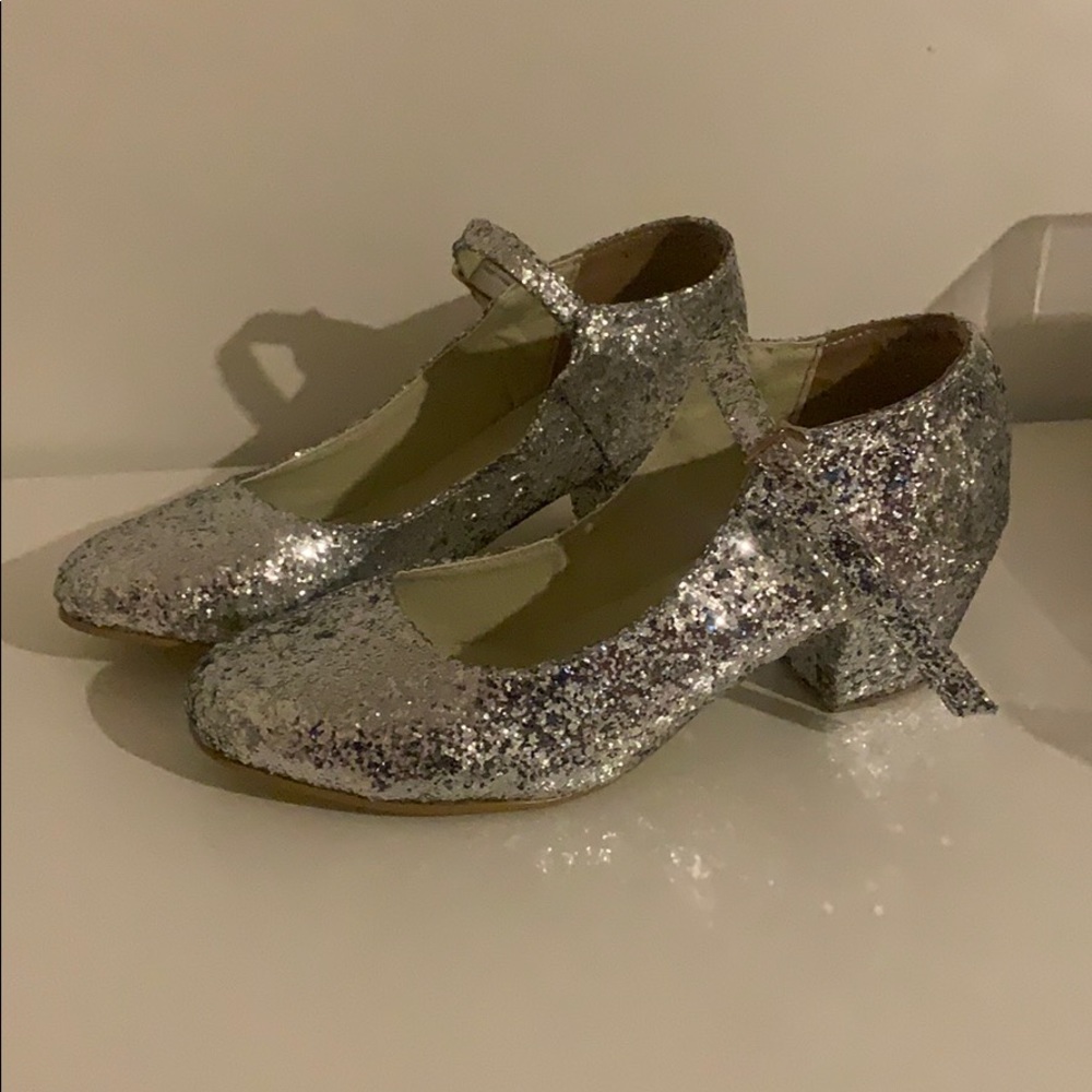 Golden ponies Mary Jane heels.